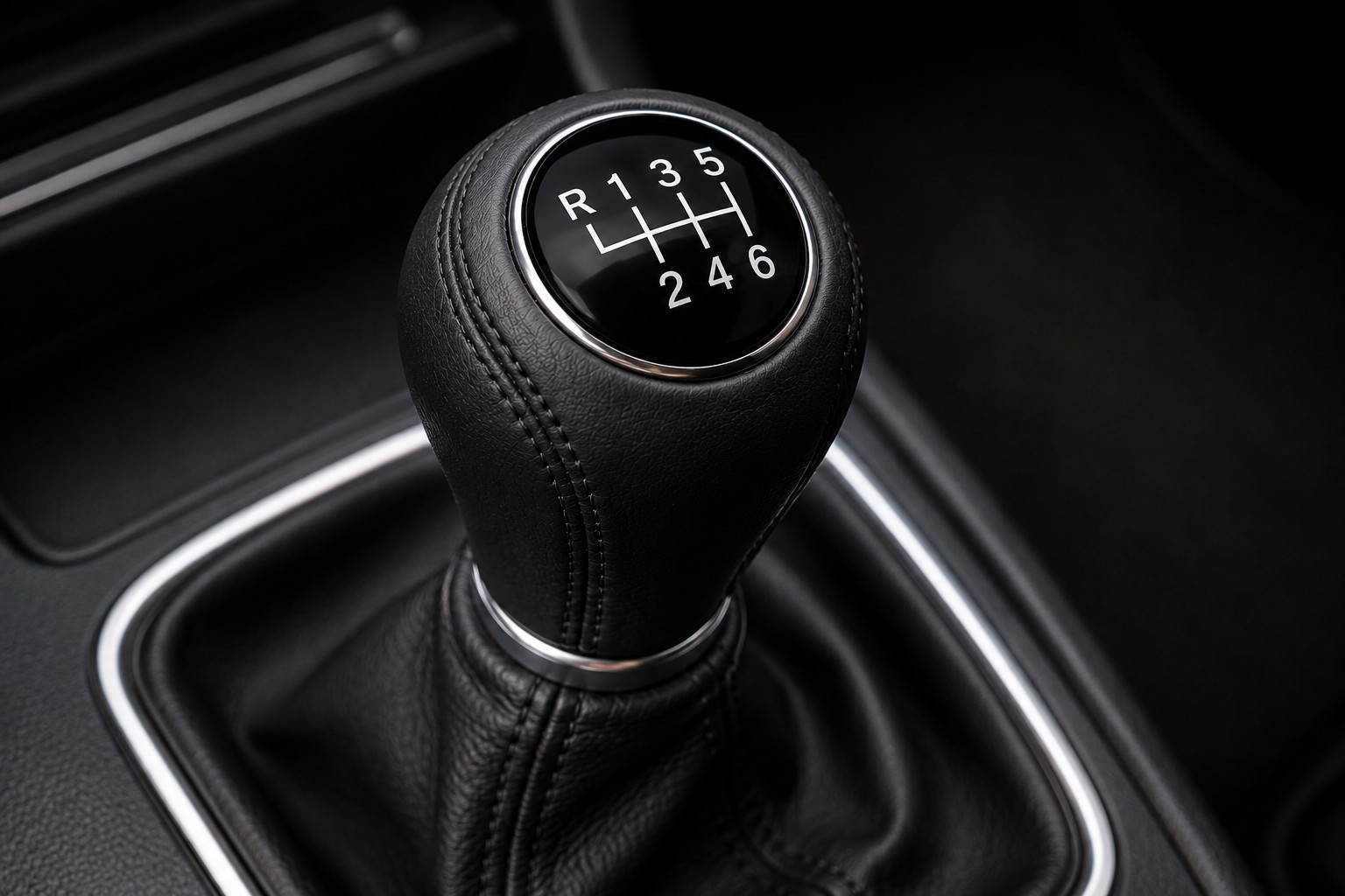 After: repaired gear knob with clean stitching