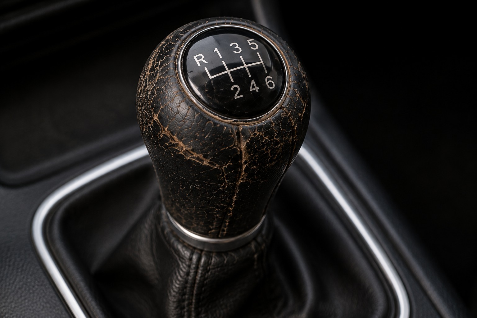 Before: cracked and peeling gear knob leather