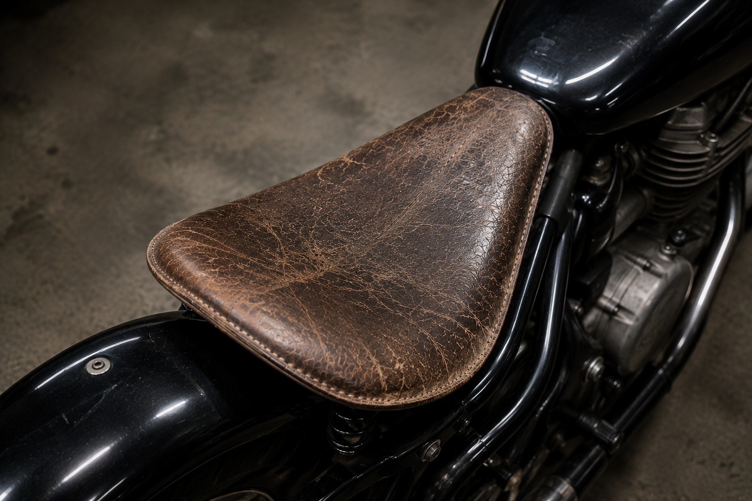 Before: cracked and faded motorcycle seat leather